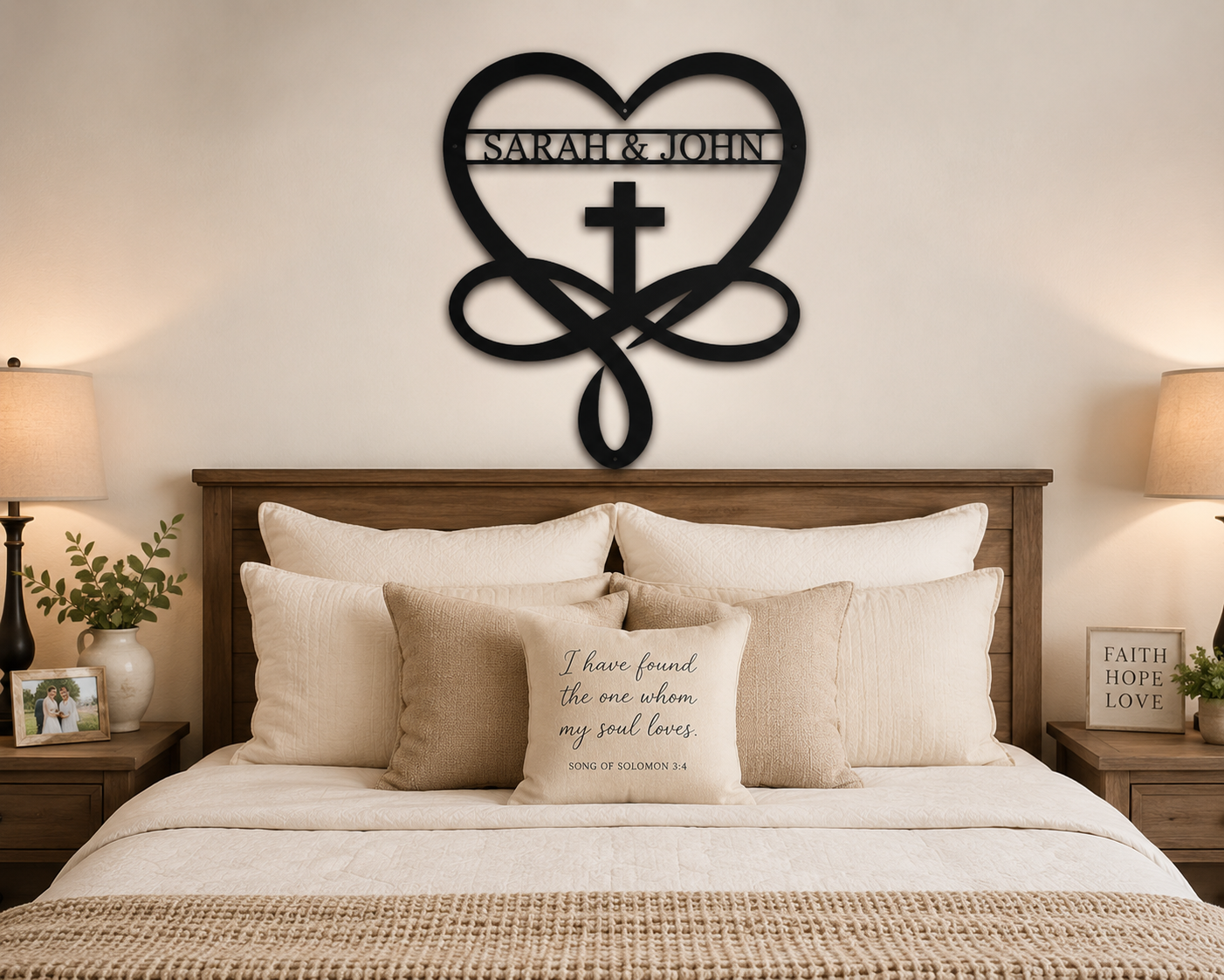 Personalized heart and cross metal sign displayed above a bedroom wall